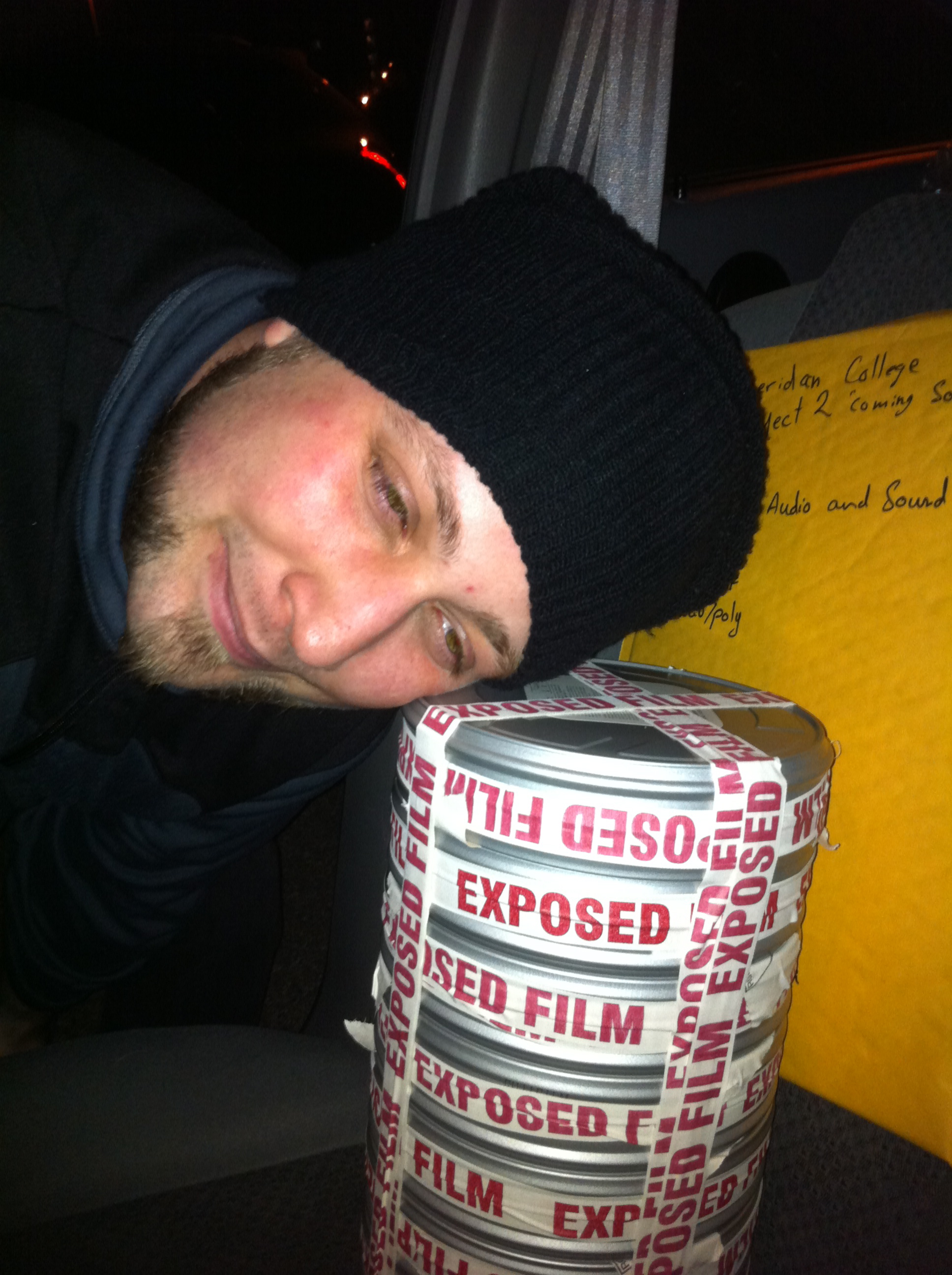 A stack of exposed film cans