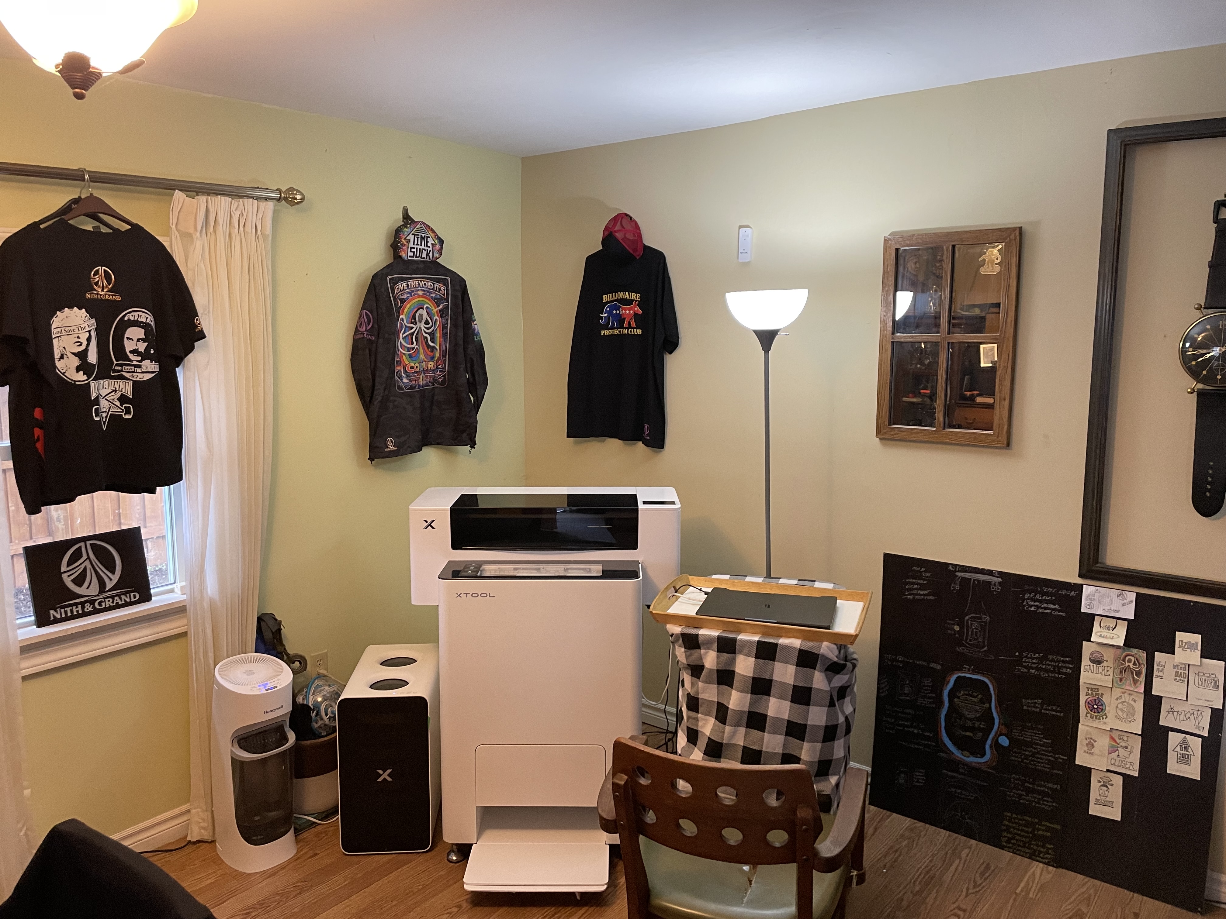 Finished shirts hanging in the studio